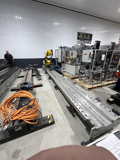 Used 2019 FANUC RTU-1000 ROBOT TRANSFER UNIT WITH 20' TRAVEL SET UP TO RUN WITH R-30iB CONTROLLER