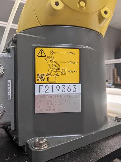 Used FANUC LR MATE 200iD/7L ROBOTIC CELL WITH R-30iB PLUS WITH ENCLOSURE LIGHT CURTAINS VISION READY
