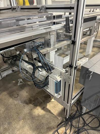 Used FANUC M10iA/12 6 AXIS ROBOT CELL WITH R-30iB PLUS CONTROLLER 2 PASS THRU CONVEYORS