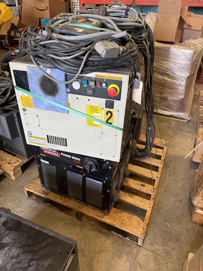 Used GENESIS SYSTEM 3X DUAL TRUNION MIG WELDING CELL WITH 2 ARC MATE 100iC R-30iB ROBOTS