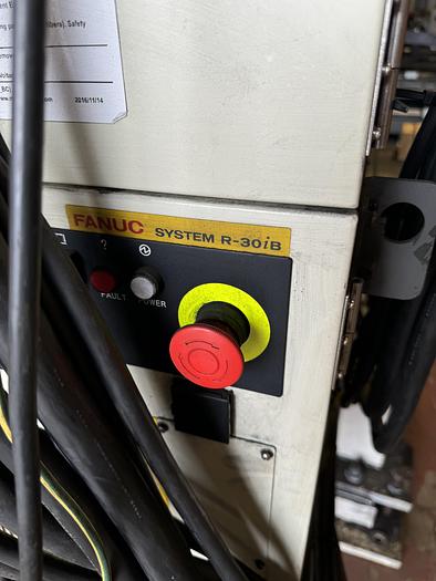 Used FANUC R-2000iC/165F ROBOT WITH R-30iB 7TH & 8 AXIS CONTROL ON 3 METER RTU WITH SERVO SPOT WELD GUN 2 UNITS AVAILABLE