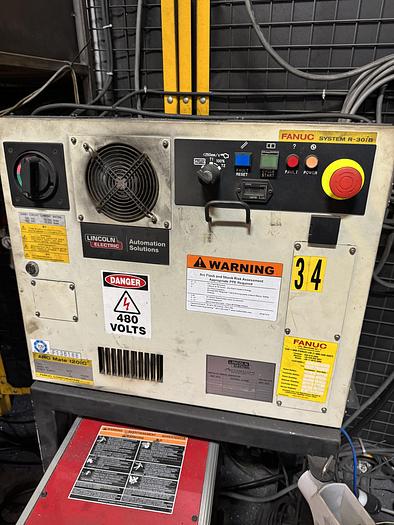 Used LINCOLN FANUC MIG WELDING CELL WITH ARC MATE 120iC & ARC MATE 120iC/12L R-30iB DUAL TRUNNION
