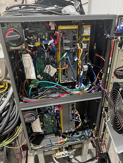 Used FANUC ARC MATE 120iD/12L, DUAL ARM, NEVER USED, R30iB PLUS, LINCOLN R450 WELDING POWER SUPPLY, TILT TURN POSITIONER