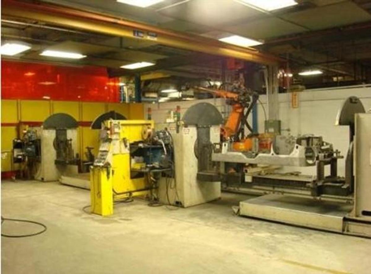 Used GENESIS DUAL TRUNNION ROBOTIC WELD CELL WITH KUKA KR 30 L15/2 ROBOT