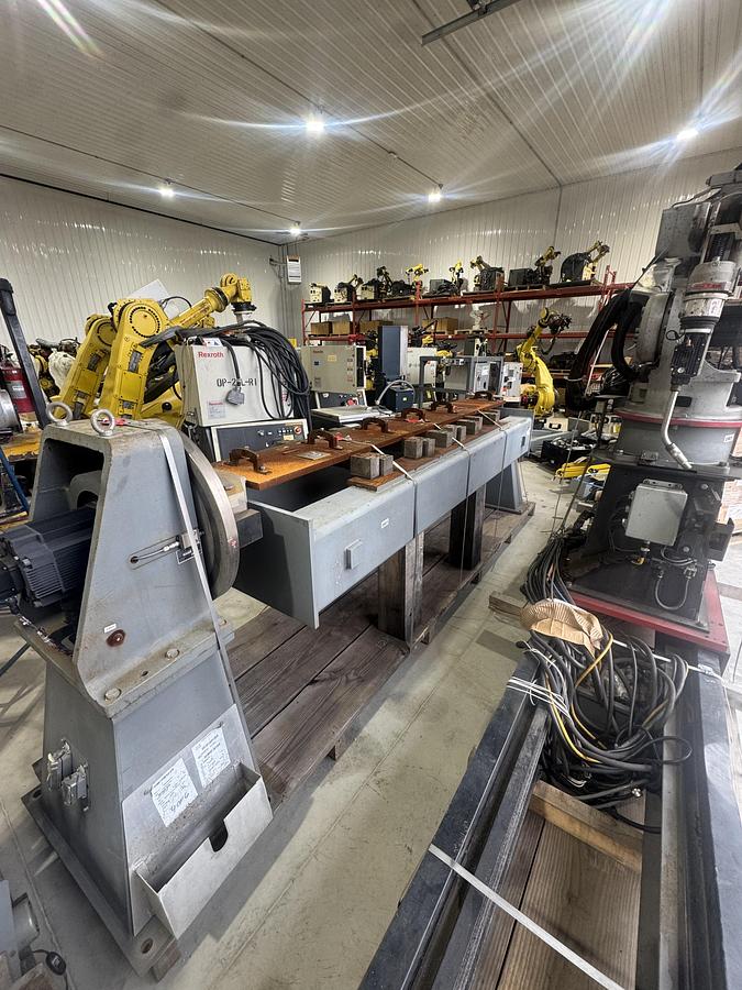 Used MOTOMAN EA1900N MIG WELDING CELL WITH TRUNNION AND 7TH AXIS RTU FOR SALE