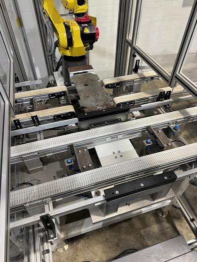 Used FANUC M10iA/12 6 AXIS ROBOT CELL WITH R-30iB PLUS CONTROLLER 2 PASS THRU CONVEYORS