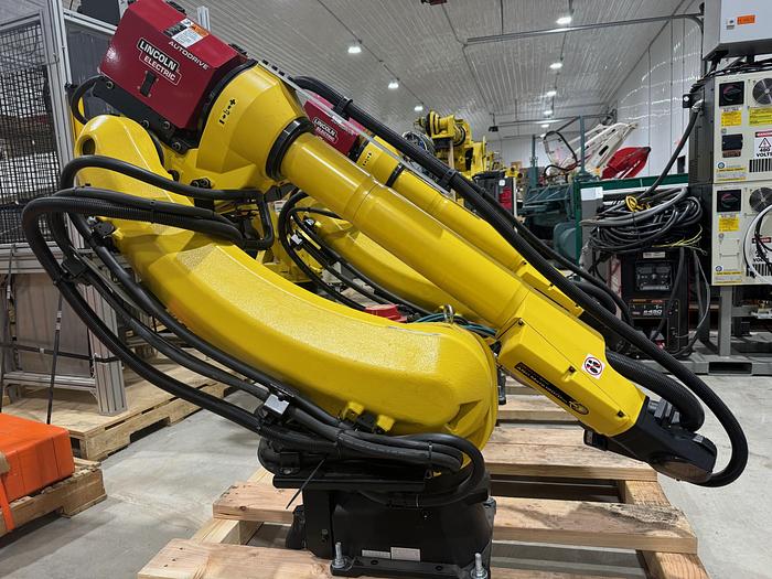 Used FANUC ARC MATE 120iD/12L, DUAL ARM, NEVER USED, R30iB PLUS, LINCOLN R450 WELDING POWER SUPPLY, TILT TURN POSITIONER