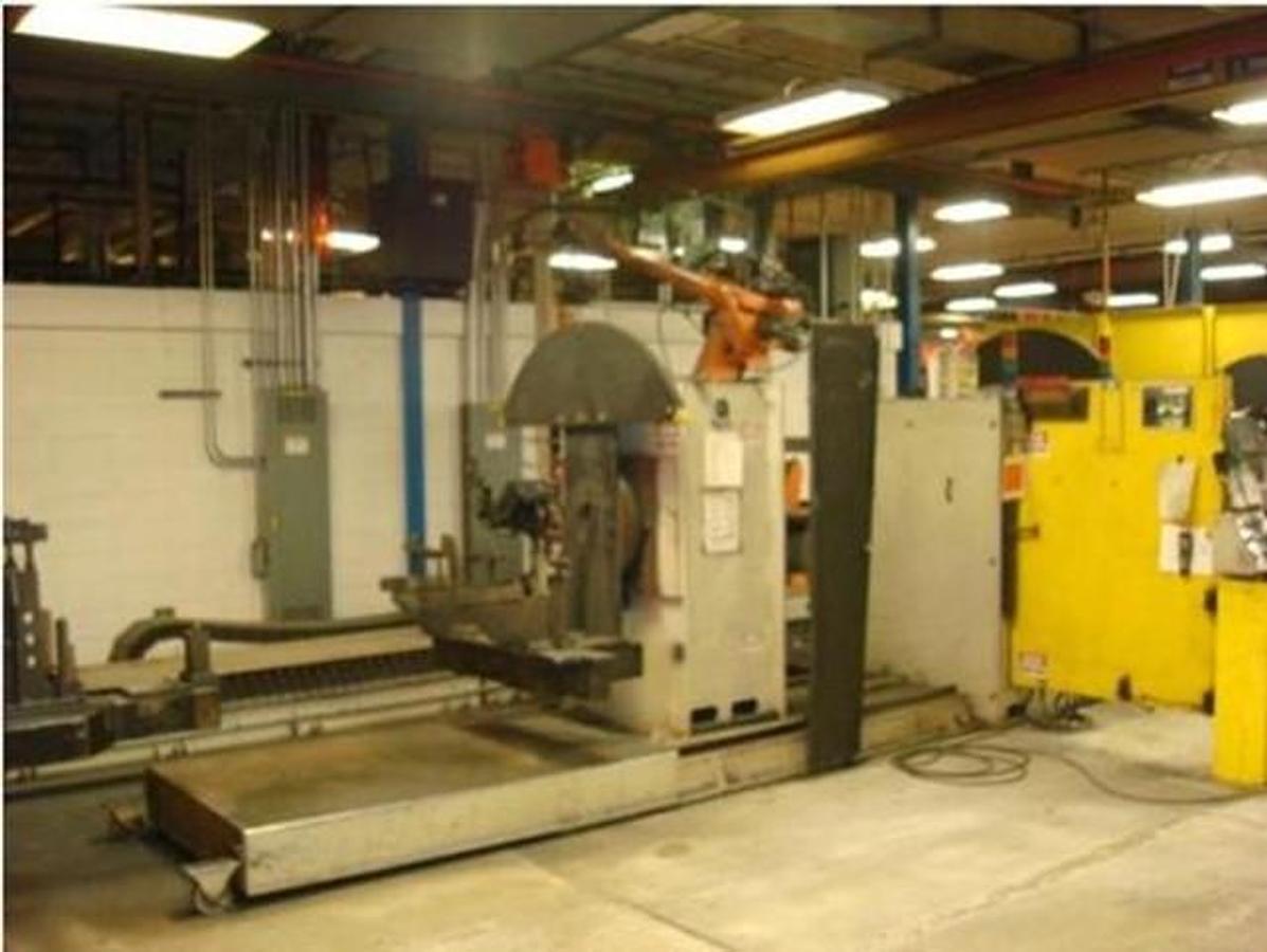 Used GENESIS DUAL TRUNNION ROBOTIC WELD CELL WITH KUKA KR 30 L15/2 ROBOT