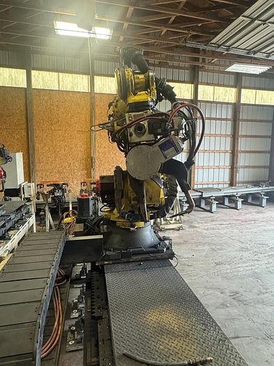 Used FANUC R-2000iC/165F ROBOT WITH R-30iB 7TH & 8 AXIS CONTROL ON 3 METER RTU WITH SERVO SPOT WELD GUN 2 UNITS AVAILABLE