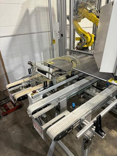 Used FANUC M10iA/12 6 AXIS ROBOT CELL WITH R-30iB PLUS CONTROLLER 2 PASS THRU CONVEYORS