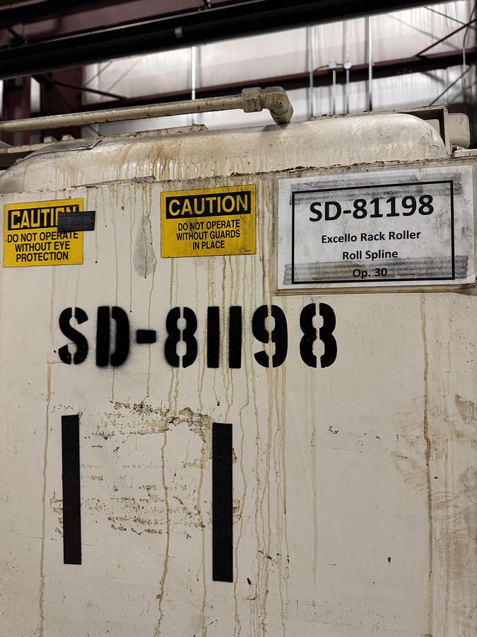 Used EXCELLO 3251S 48" SPLINE ROLLER WITH UNDER ARM SUPPORT AND 40 HP MAIN MOTOR