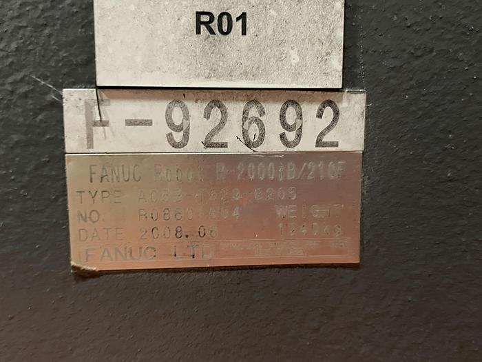 Used FANUC R-2000iB/210F ROBOT RTU CELL WITH 2 ROBOTS, R30IA CONTROLS AND 50' OF TRAVEL.