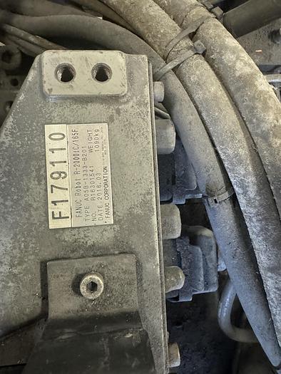 Used FANUC R-2000iC/165F ROBOT WITH R-30iB 7TH & 8 AXIS CONTROL ON 3 METER RTU WITH SERVO SPOT WELD GUN 2 UNITS AVAILABLE