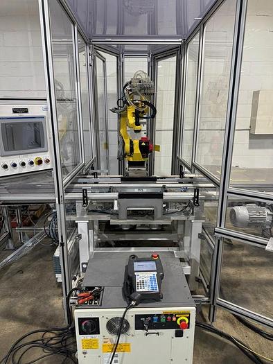Used FANUC M10iA/12 6 AXIS ROBOT CELL WITH R-30iB PLUS CONTROLLER 2 PASS THRU CONVEYORS