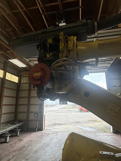 Used FANUC R-2000iC/165F ROBOT WITH R-30iB 7TH & 8 AXIS CONTROL ON 3 METER RTU WITH SERVO SPOT WELD GUN 2 UNITS AVAILABLE
