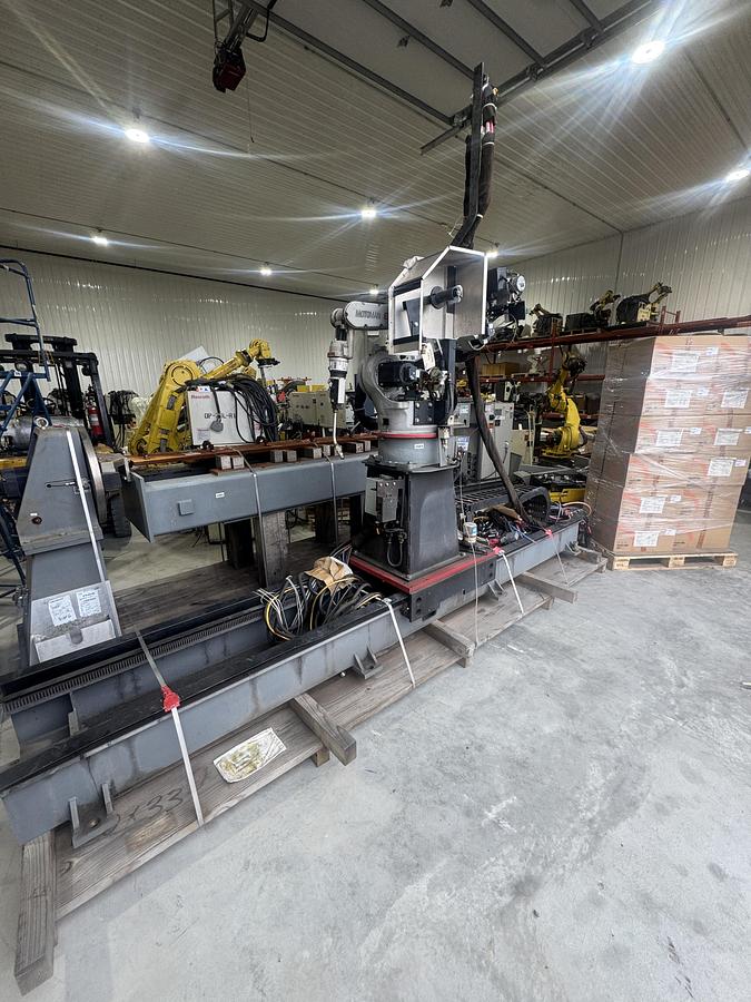 Used MOTOMAN EA1900N MIG WELDING CELL WITH TRUNNION AND 7TH AXIS RTU FOR SALE