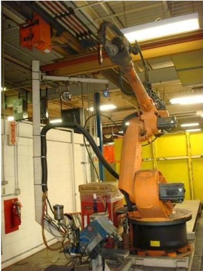 Used GENESIS DUAL TRUNNION ROBOTIC WELD CELL WITH KUKA KR 30 L15/2 ROBOT