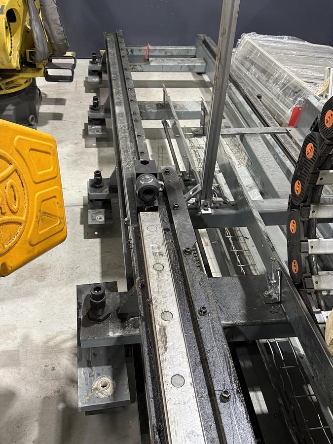 Used FANUC R-2000iB/125L ROBOT STAND MOUNTED ON 61' FANUC GEN VI RTU WITH R-30iB CONTROLLER