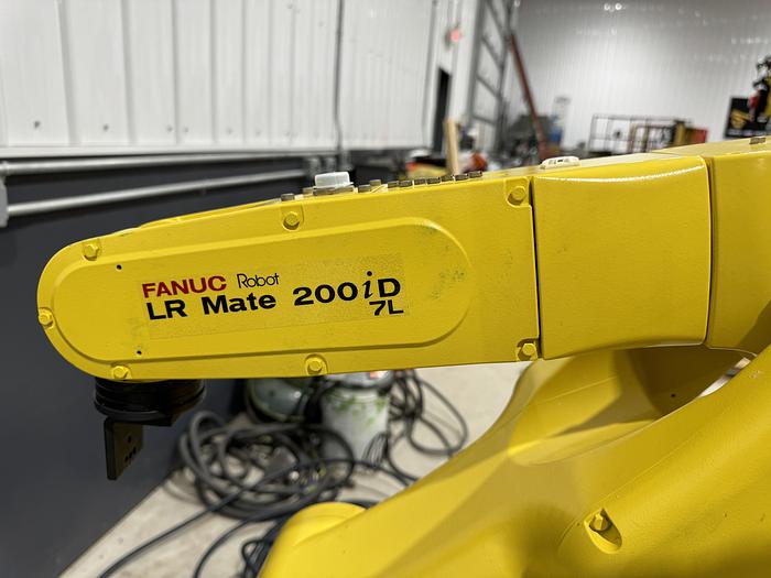 Used FANUC LR MATE 200iD/7L ROBOTIC CELL WITH R-30iB PLUS WITH ENCLOSURE LIGHT CURTAINS VISION READY