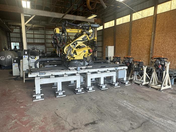 Used FANUC R-2000iC/165F ROBOT WITH R-30iB 7TH & 8 AXIS CONTROL ON 3 METER RTU WITH SERVO SPOT WELD GUN 2 UNITS AVAILABLE