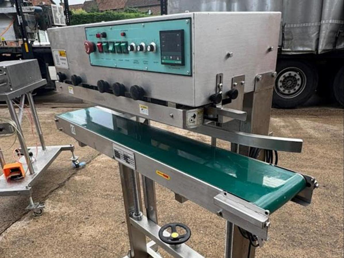 As new CONTINUOUS BAG SEALER