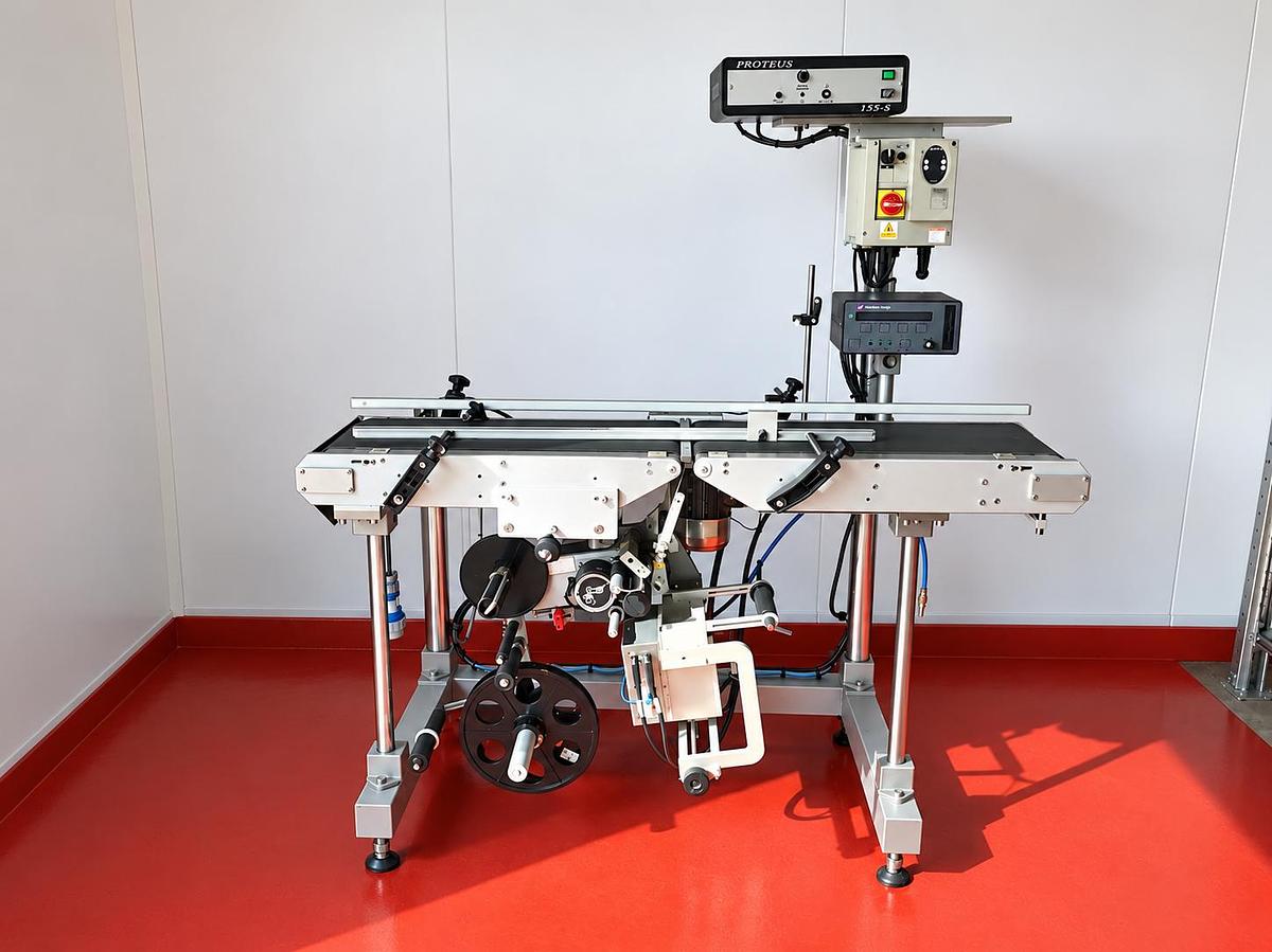 Used HARLAND PROTEUS LABEL APPLICATOR