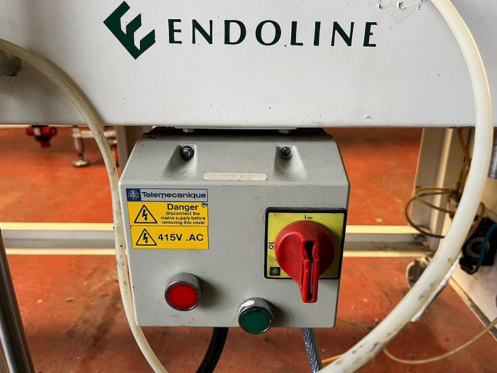 Used ENDOLINE FULLY AUTOMATIC CASE TAPER