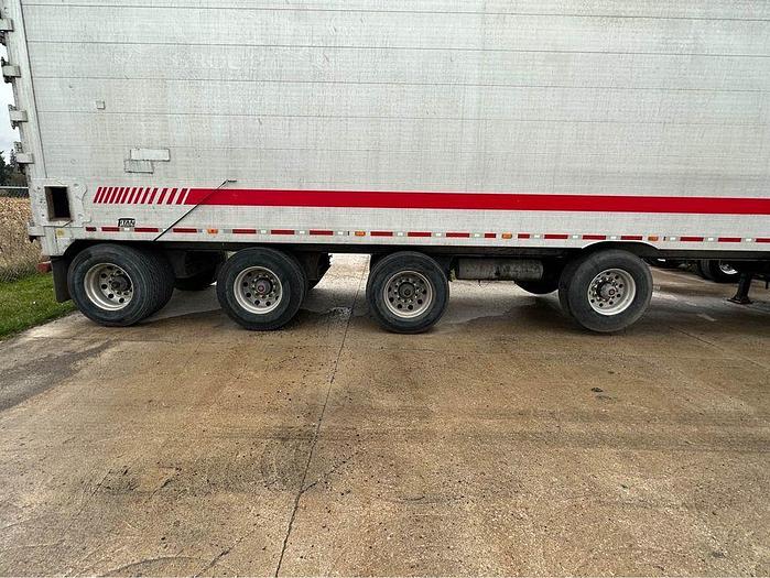 Used 2010 Titan 53 foot quad axle closed to Aluminum Live bottom