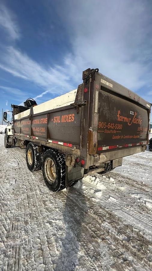 Used 2010 International 7600 Crane truck with a dump box