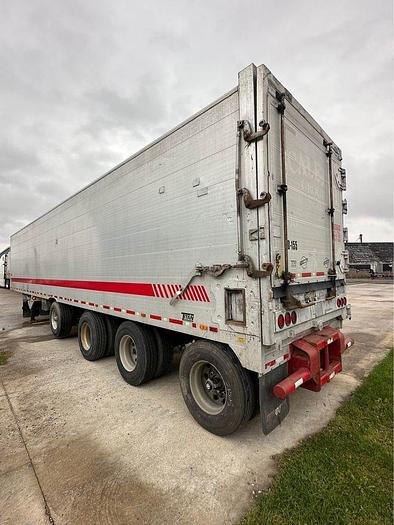 Used 2010 Titan 53 foot quad axle closed to Aluminum Live bottom