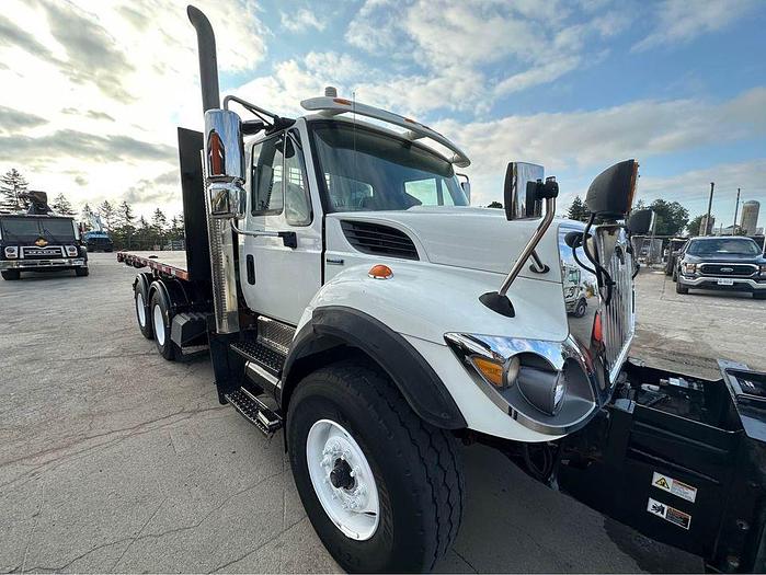 Used 2009 INTERNATIONAL 9400 ROLL OFF recovery deck with plow