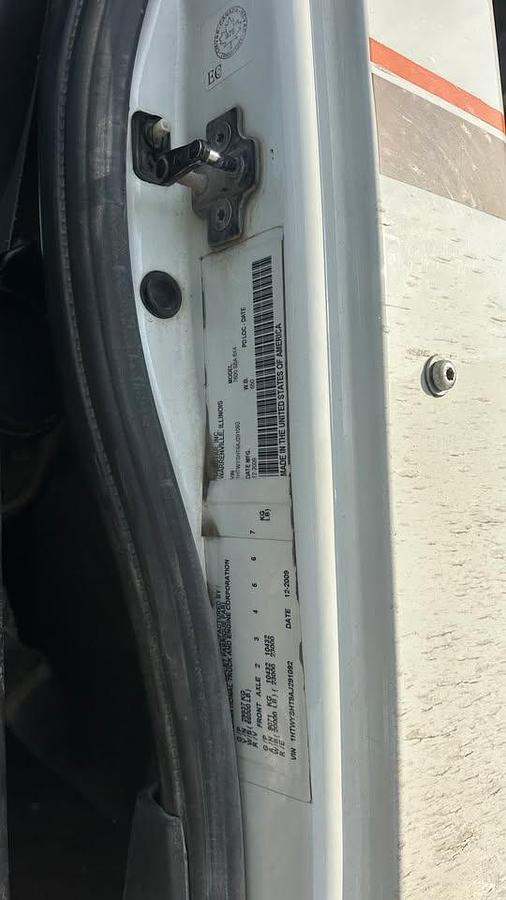 Used 2010 International 7600 Crane truck with a dump box