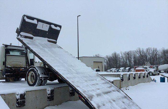 Used 2009 INTERNATIONAL 4300 SBA Durastar 4x2 Rolloff Truck