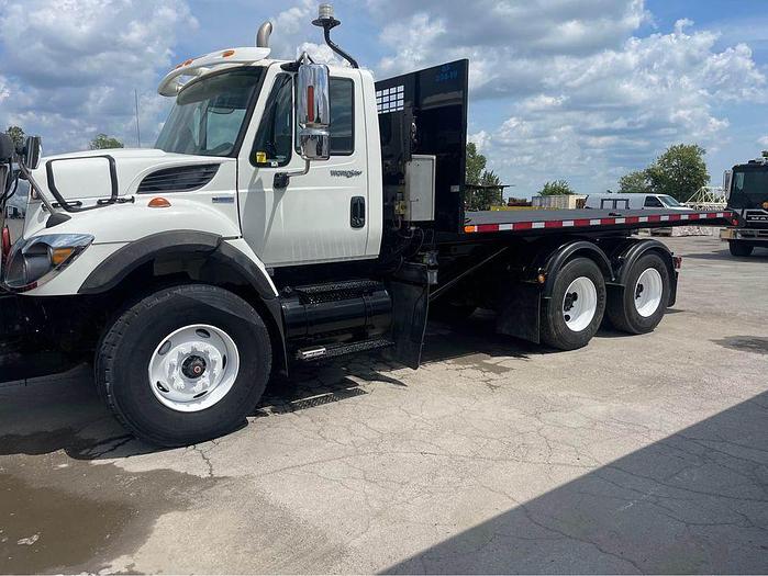 Used 2009 INTERNATIONAL 9400 ROLL OFF recovery deck with plow