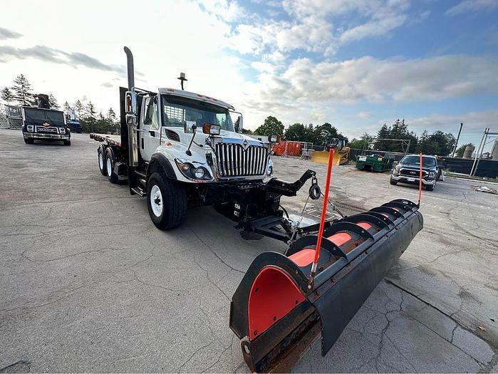 Used 2009 INTERNATIONAL 9400 ROLL OFF recovery deck with plow