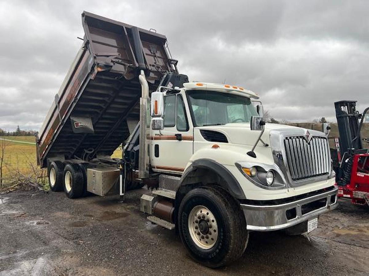Used 2010 International 7600 Crane truck with a dump box