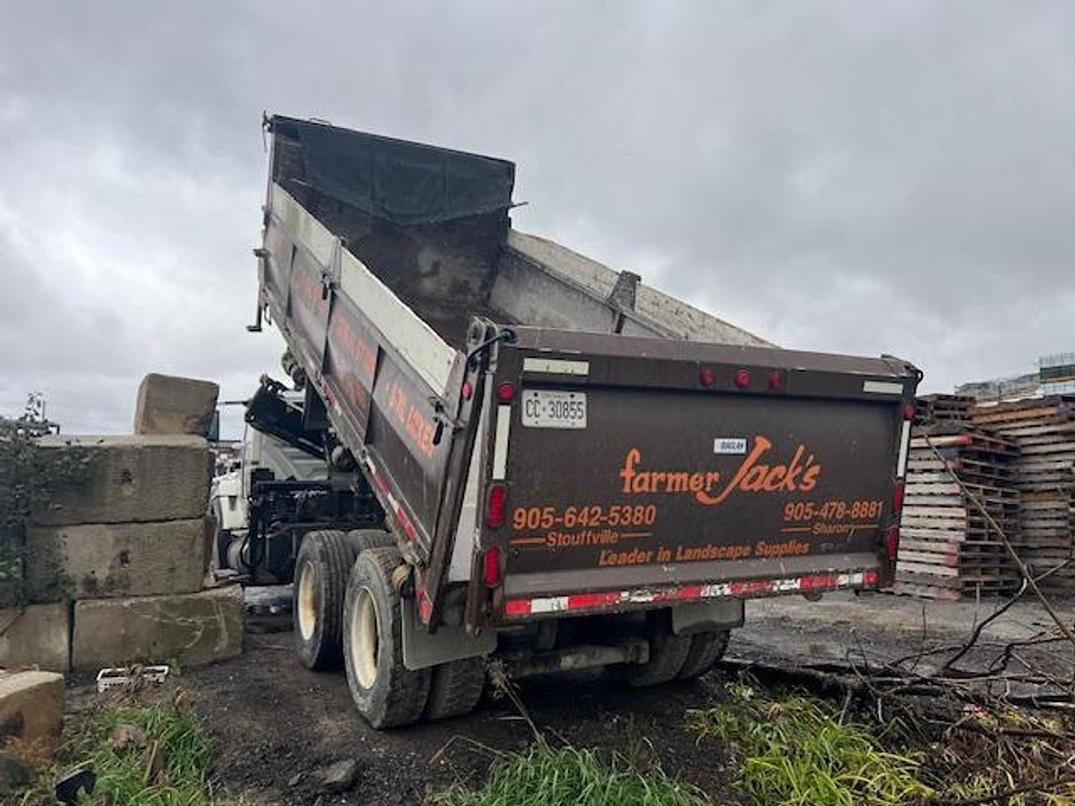 Used 2010 International 7600 Crane truck with a dump box