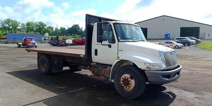 Used INTERNATIONAL DURA STAR DUMP 18 foot flat deck g licence