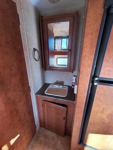 Used 2012 WEEKENDER 25' REAR BUNKS TRAVEL TRAILER $15,995.