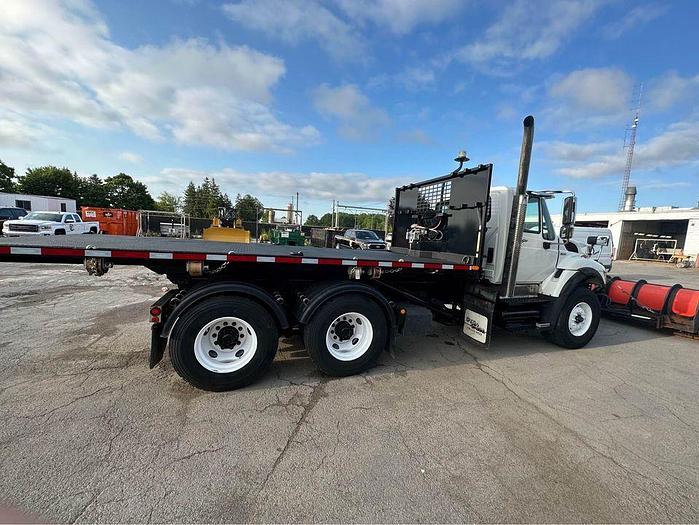 Used 2009 INTERNATIONAL 9400 ROLL OFF recovery deck with plow