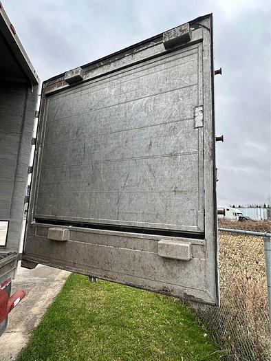 Used 2010 Titan 53 foot quad axle closed to Aluminum Live bottom