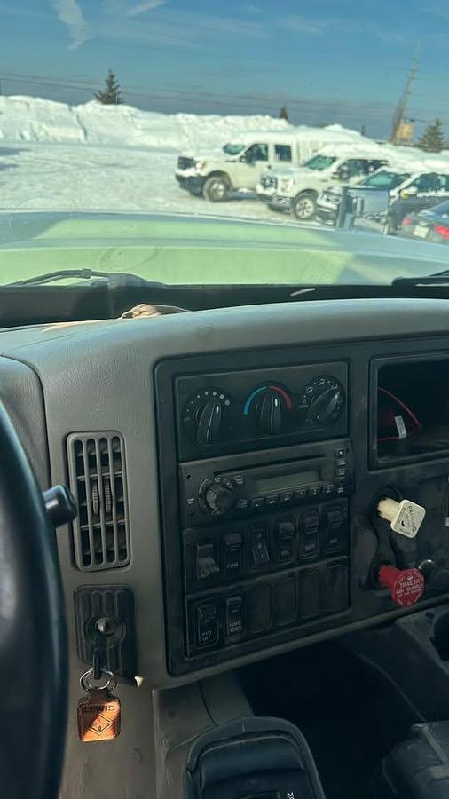 Used 2010 International 7600 Crane truck with a dump box