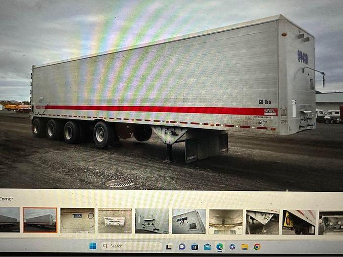 Used 2010 TITAN 53 ft Quad/Axle Closed Top aluminum live bottom