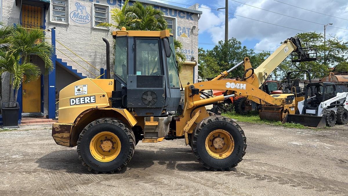 Used 2004 JOHM DEERE 304H WHEEL LOADER 