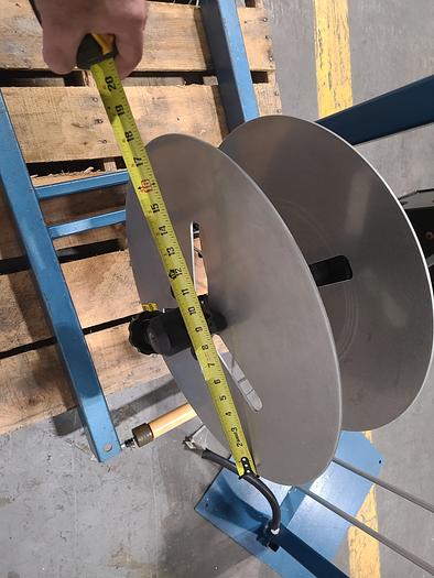 Used Rapid Air Industries Dual Motorized Stock Feed Reels with Antenna Feed Control. 