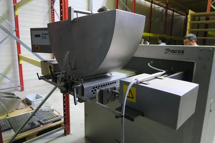 Used Hacos Depositor for chocolate or cream centres