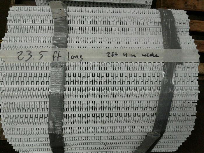 Used Used FLIGHTED plastic conveyor belt, 23.5 ft long, 28" wide
