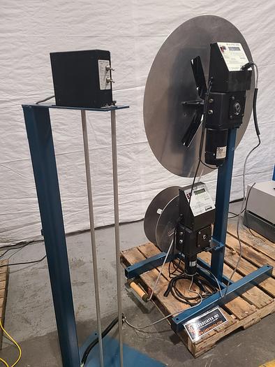 Used Rapid Air Industries Dual Motorized Stock Feed Reels with Antenna Feed Control. 