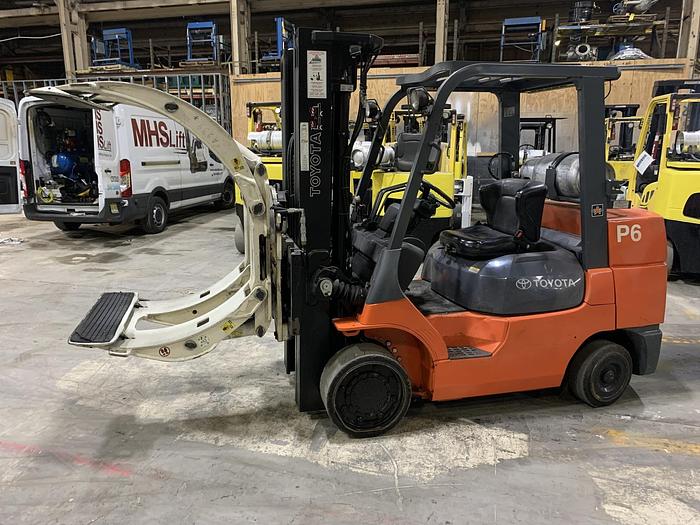 Used 8,000 POUND TOYOTA FORKLIFT MODEL 7FGCU35 WITH 63" CASCADE PAPER CLAMP