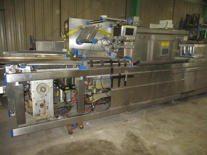 Used 2008 REPAK ROLLSTOCK PACKAGER, 18" WIDE BETWEEN CHAINS, 220 VOLT, BUILT 2008 RE-20